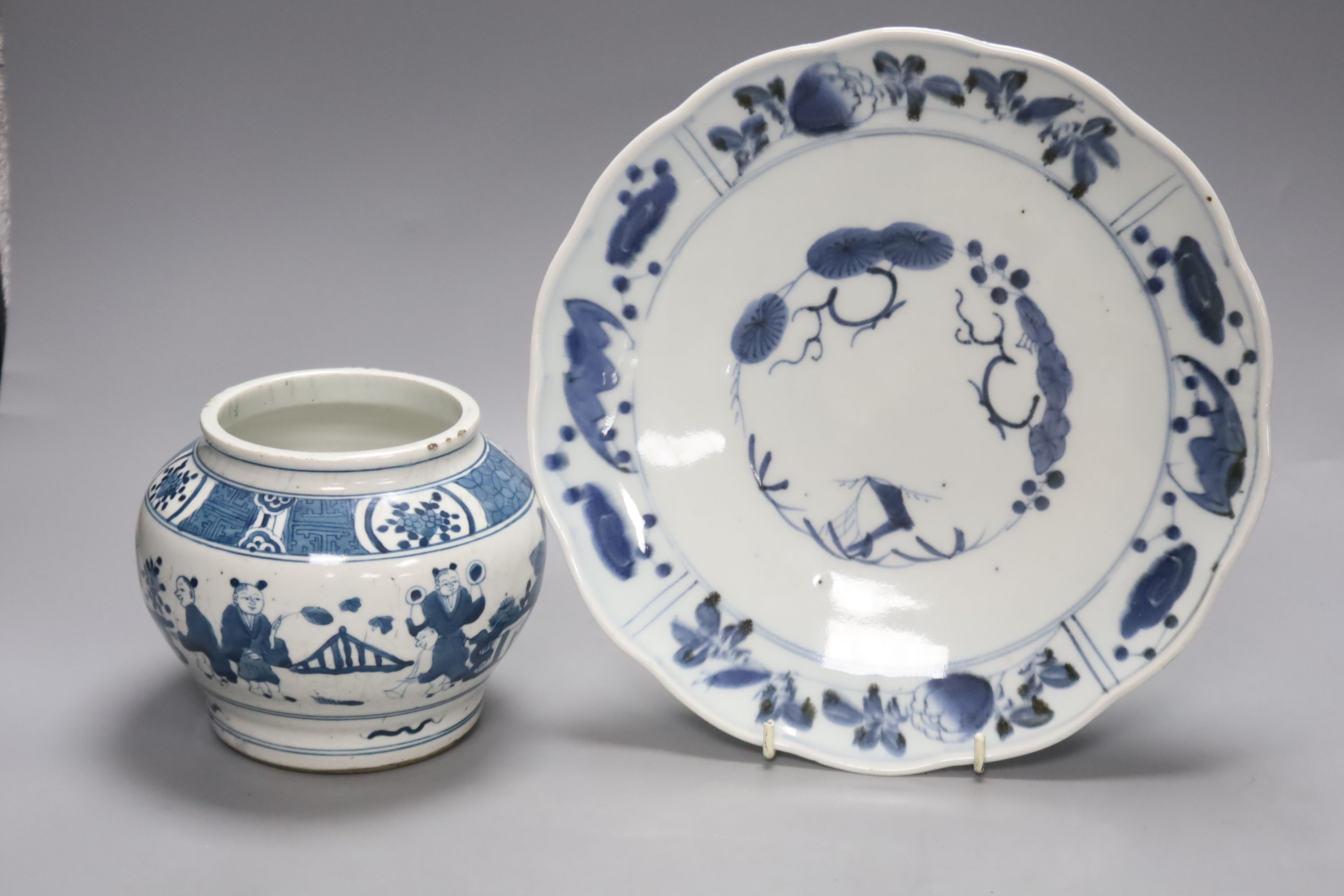 A Japanese Arita blue and white dish with scalloped edge, 29cm diameter and a modern Chinese jar